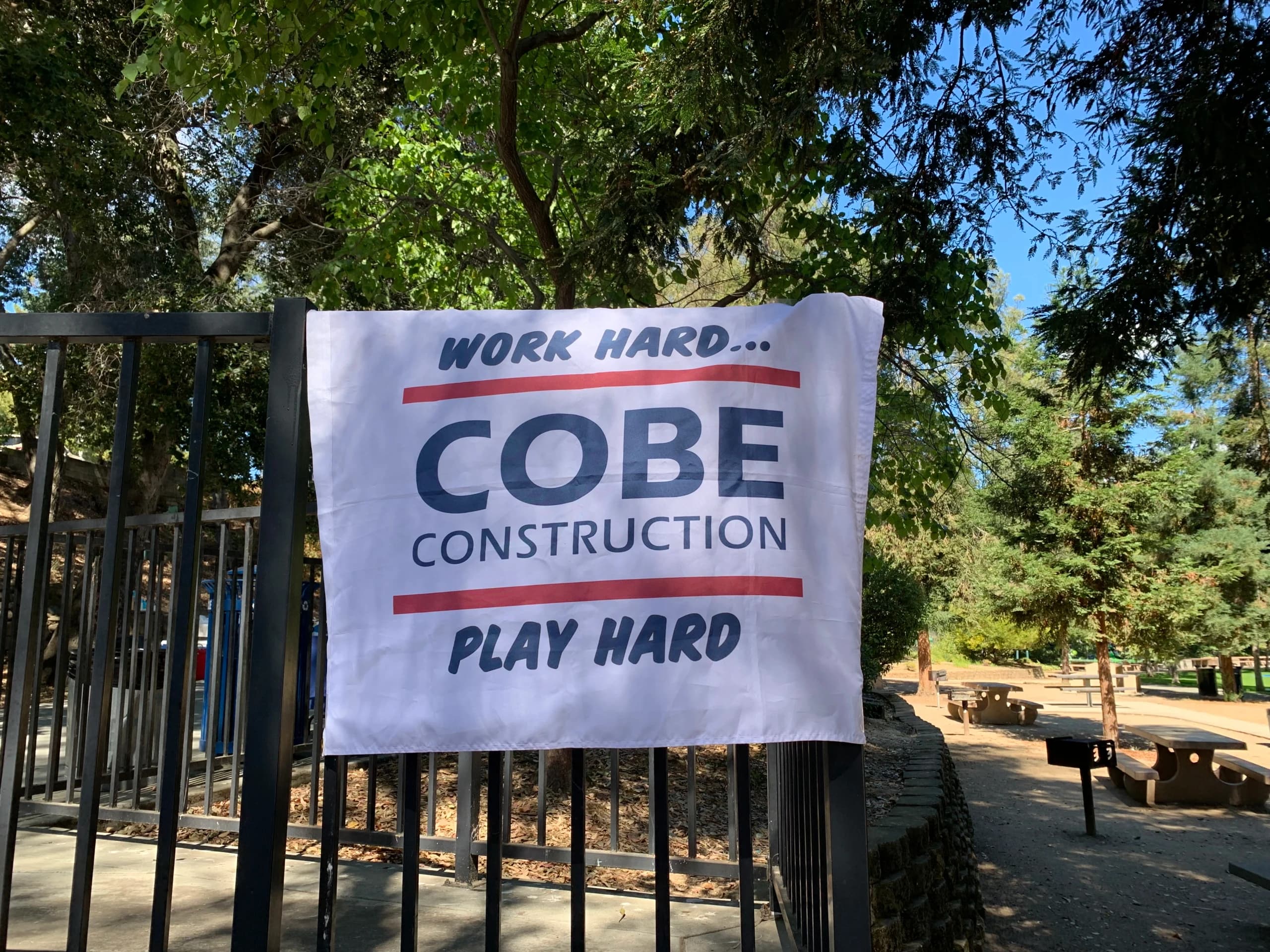 COBE team raising the flag on a Bay Area jobsite